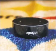  ?? Jessie Wardarski / Associated Press ?? The Alexa Echo Dot by Amazon will offer a service aimed at appealing to bored children.