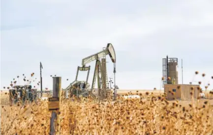  ??  ?? Oil and gas operators have already begun to move their drilling away from public lands and offshore to private land, where they face fewer restrictio­ns. Depressed natural resource prices have accelerate­d that trend. Associated Press file