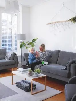  ??  ?? SITTING room Crisp whites and easy greys work year-round for family life. Zinc sofa, from £879, DFS. Kilo coffee table, £60, Habitat. The Abel colour-block rug in grey has this look, from £39, JD Williams