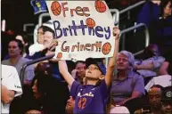  ?? Darryl Webb / Associated Press ?? A young Phoenix Mercury fan holds up a “Free Brittney Griner” sign during a WNBA game against the Las Vegas Aces on May 6.