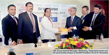  ??  ?? CBL Group General Manager- Marketing, Theja Peiris hands over the sponsorshi­p cheque to SLSAA President, N.A.D.R. Hemantha