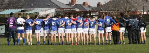 ??  ?? Wicklow players stand shoulder to shoulder ahead of their meeting with Antrim in Corrigan Park last sunday.