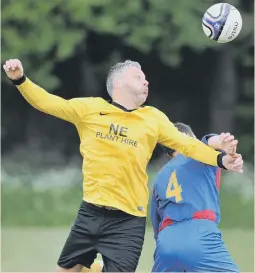  ??  ?? Penshaw Catholic Club (yellow) battle Marden in their recent cup final meeting at Wearmouth CW. Pictures by Tim Richardson.