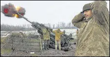  ?? AFP ?? Ukrainian artillerym­en fire a howitzer towards Russian positions on the frontline of eastern Ukraine, on Wednesday.