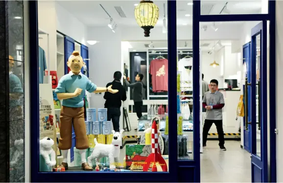  ??  ?? The first official Tintin Shop in China has opened in Shanghai.