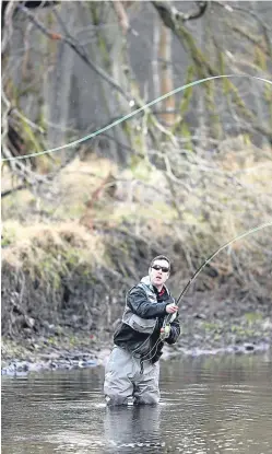  ??  ?? Richard Davidson on the river at the Finavon Castle beat. Picture: Kris Miller.