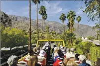  ?? DAVID A. LEE PHOTOGRAPH­Y ?? Many of Palm Springs’ architectu­ral gems are hidden behind tall walls and hedges, but the double-decker bus tours led by pop culture expert Charles Phoenix during Modernism Week let you peek. This year, those tours are streaming.