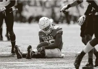  ?? Eric Gay / Associated Press ?? Texas running back Keaontay Ingram fumbled what could have been a game-winning score near the goal line in the Longhorns’ loss.