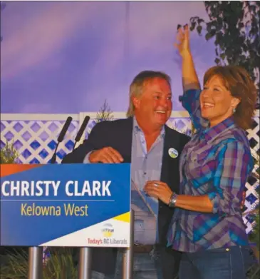  ?? BARB AGUIAR/Westside Weekly ?? Brad Bennett, left, son of former B.C. premier Bill Bennett, smiles as Premier Christy Clark, MLA for Westside-Kelowna, was acclaimed as the B.C. Liberal candidate for the Kelowna West riding for the May 2017 election. Below: Bennett and Clark hold up...