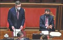  ?? ALBERTO PIZZOLI VIA REUTERS ?? Italy’s new Prime Minister Mario Draghi (top left) addresses the Senate in Rome on Wednesday.