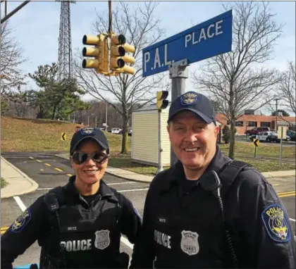  ?? SUBMITTED PHOTO ?? Hamilton Officer Tom White, right, was killed in a crash while off duty Monday afternoon. With him in this photo is Kristin Seitz.