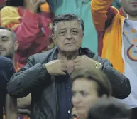  ??  ?? Yılmaz Vural watches a match between Galatasara­yPSG, in Istanbul, Turkey, Oct. 1, 2019.