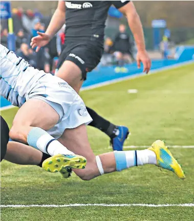  ??  ?? Convincing response: Sean Maitland scores one of six second-half tries for Saracens against Cardiff