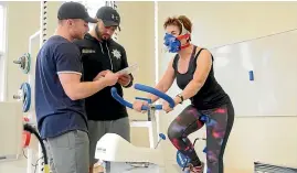  ?? MARY JAKSCH ?? Nelson Marlboroug­h Institute of Technology exercise students Ricky Silva and Isaiah Stevenson put Mary through her paces to gauge her baseline fitness.