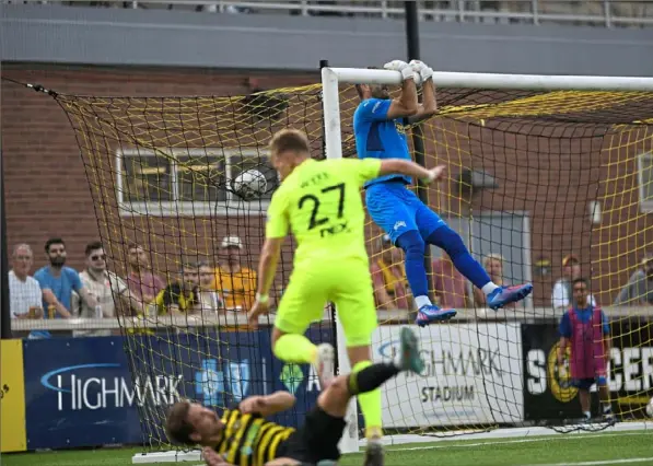  ?? Maya Giron/Post-Gazette ?? The Riverhound­s’ attempt to score is blocked by Tampa Bay’s CJ Cochran Saturday night at Highmark Stadium.