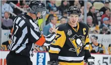  ?? ASSOCIATED PRESS FILE PHOTO ?? Pittsburgh Penguins' Sidney Crosby, right, listens to ref Garrett Rank in an NHL game against the Detroit Red Wings on Feb. 19, 2017.