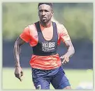  ??  ?? DETERMINED Defoe eyes big season