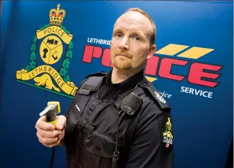  ?? Herald photo by Ian Martens @IMartensHe­rald ?? Traffic Sgt. Wade Davidson, holding a roadside screening device, says Lethbridge police will be implementi­ng mandatory alcohol screening when new federal legislatio­n comes into effect later this month.