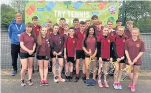  ??  ?? ●● Tytheringt­on pupils who are training for the Lawn Tennis Associatio­n Leader Award at Prestbury Tennis Club