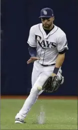  ?? CHRIS O’MEARA, THE ASSOCIATED PRESS ?? Tampa Bay’s Kevin Kiermaier fields a single by Toronto Blue Jays’ Kevin Pillar during the first inning Friday in St. Petersburg, Fla. For game results go to thespec.com.