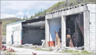  ?? J. R. ROY / SPECIAL TO THE GULF NEWS ?? The former fish plant in Rose Blanche–harbour Le Cou rots on the wharf adjacent to where the La Poile ferry docks.