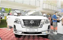  ?? ?? Nissan displayed its flagship SUV, the Patrol Royale, in pristine white.