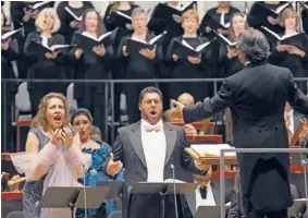  ?? | TODD ROSENBERG PHOTOGRAPH­Y ?? Soprano Tatiana Serjan, as Lady Macbeth, and baritone Luca Salsi, in the title role, sing Verdi’s “Macbeth” under the direction of Riccardo Muti at Saturday’s Chicago Symphony Orchestra concert.