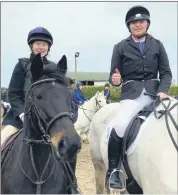  ?? (Pic: Presentati­on SS) ?? Ciara Moriarity, 3rd year and Emily Gorey, 5th year, representi­ng Presentati­on Secondary School, Mitchelsto­wn at a recent inter schools’ equestrian competitio­n.