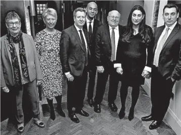  ?? DANIEL LEAL-OLIVAS/GETTY-AFP ?? Former Labour MPs Ann Coffey, from left, Angela Smith, Chris Leslie, Chuka Umunna, Mike Gapes, Luciana Berger, and Gavin Shuker pose Monday after announcing their breakaway.