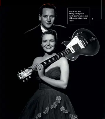  ??  ?? Les Paul and Mary Ford pose with Les’ namesake Gibson guitar circa 1955
