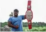  ?? AFP ?? Ashraf Mahrous poses with the championsh­ip belt. —