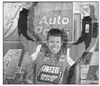  ??  ?? AP/ZACH GIBSON
Carl Edwards won Saturday night’s Federated Auto Parts 400 at Richmond Internatio­nal Raceway.