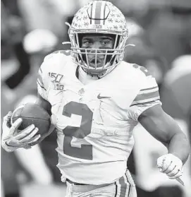  ?? PAUL SANCYA/AP ?? Ohio State’s J.K. Dobbins provides another weapon in the backfield for the Ravens.