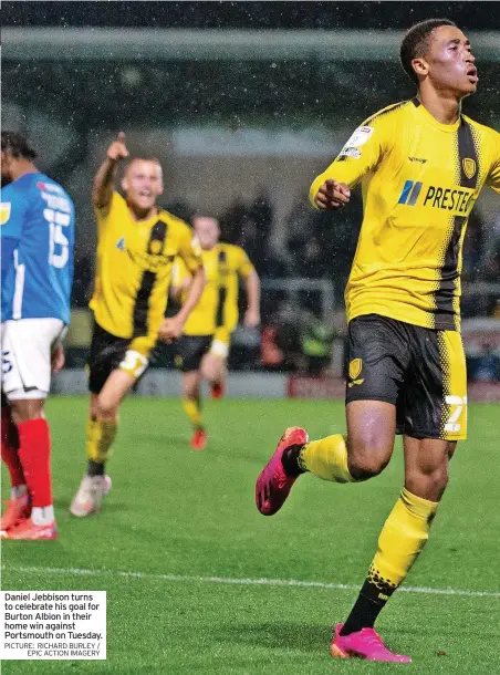  ?? PICTURE: RICHARD BURLEY / EPIC ACTION IMAGERY ?? Daniel Jebbison turns to celebrate his goal for Burton Albion in their home win against Portsmouth on Tuesday.