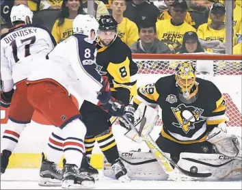  ?? Peter Diana/Post-Gazette ?? Marc-Andre Fleury makes a save against the Blue Jackets in the first period Friday at PPG Paints Arena. Fleury has been brilliant, allowing just two goals in two games.