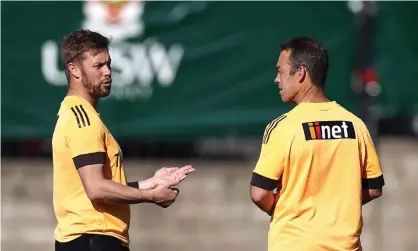  ?? Photograph: Ryan Pierse/Getty Images ?? Hawthorn coach Alastair Clarkson (right) will hand over the reins to Sam Mitchell in 2023.