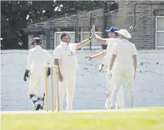  ?? ?? Warley’s Chris Greenwood celebrates his wicket.