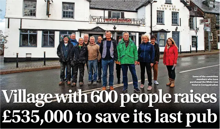  ?? Andrew Price ?? > Some of the committee members who have purchased the White Lion Hotel in Cerrigydru­dion