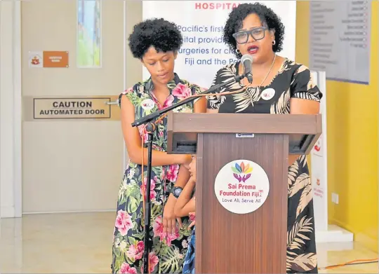  ?? Pictures: RUSIATE VUNIREWA ?? Mother Esther Rokobuli, right, shares her daughter Bulou Marisela Rokobuli’s journey as a former patient of Sri Sathya Sai Sanjeevani Children’s Hospital during the launch of the congenital heart defect week in Suva yesterday.