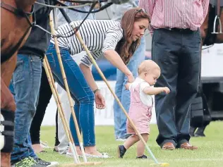  ?? Photo: Getty Images ?? First of many? Catherine, Duchess of Cambridge, and Prince George attend a polo match in Cirenceste­r, England.