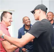  ?? JERMAINE BARNABY/FREELANCE PHOTOGRAPH­ER ?? Former Brazil teammates greet each other at the Norman Manley Internatio­nal Airport yesterday. From left: Dunga, Edílson, Rivaldo and Paulo Sergio.