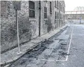  ??  ?? Found: The hijacked Skoda was burnt out at this spot in Bonham Street, Dublin