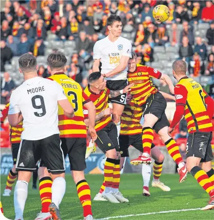  ??  ?? United’s Michael Rose rises high to head the winning goal for Ayr at Firhill yesterday