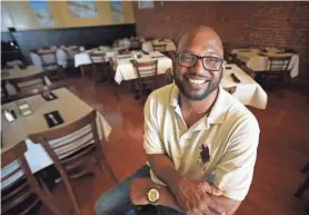  ??  ?? Following a childhood dream, Arturo Azcarate is opening a Caribbean restaurant called Curry N Jerk in Downtown Memphis this week to honor his late mother, a longtime chef at a California Marine base.