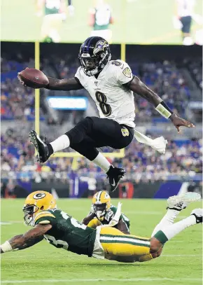  ?? GAIL BURTON/ASSOCIATED PRESS FILE ?? In his first full season as a starter, Baltimore Ravens quarterbac­k Lamar Jackson ran for a record 1,206 yards and threw 36 touchdown passes before being selected NFL MVP by a unanimous vote.