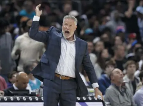  ?? CHUCK BURTON — THE ASSOCIATED PRESS ?? Sixers coach Brett Brown isn’t ready to classify his team among the NBA’s ‘royalty’ just yet, but he knows that the window for his young stars to get there is finite.