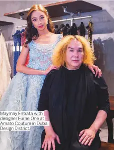 ??  ?? Maymay Entrata with designer Furne One at Amato Couture in Dubai Design District.