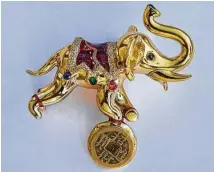  ??  ?? KEEPSAKE: A gold elephant, which is the unofficial symbol of Jones’ sorority, Delta Sigma Theta