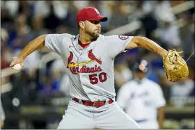  ?? FRANK FRANKLIN II — THE ASSOCIATED PRESS ?? St. Louis Cardinals’ Adam Wainwright delivers a pitch during the first inning of a baseball game against the New York Mets, Monday, Sept. 13, 2021, in New York.