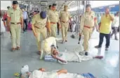  ?? HT PHOTO ?? Police carrying out a security check at Agra Cantt railway station on Tuesday after they got informatio­n of a security threat, which later turned out to be a hoax.